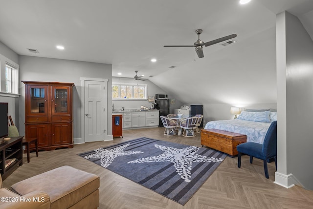 bedroom featuring black fridge, light parquet floors, ceiling fan, and lofted ceiling