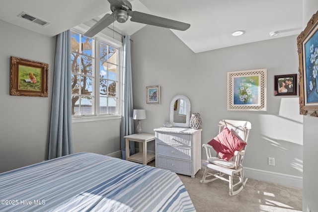 carpeted bedroom featuring ceiling fan and vaulted ceiling