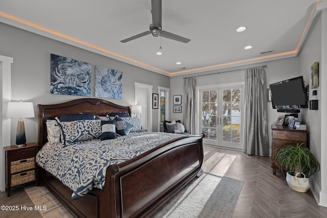 bedroom with ceiling fan, parquet floors, and ornamental molding