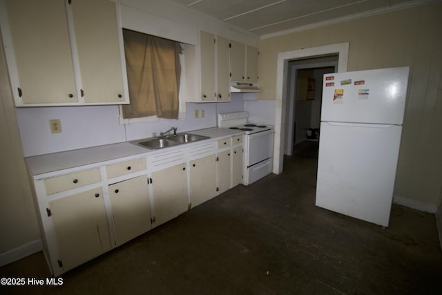 kitchen with white appliances, crown molding, and sink