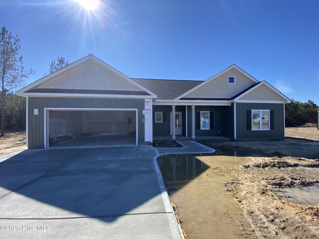 single story home featuring a garage