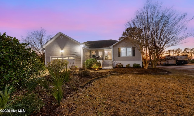 ranch-style home with a garage