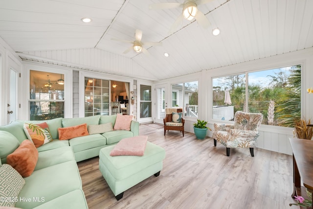 sunroom / solarium featuring ceiling fan and vaulted ceiling