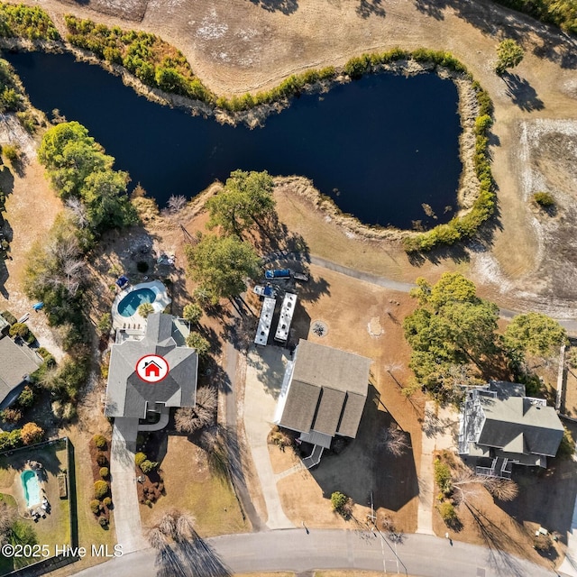 birds eye view of property featuring a water view