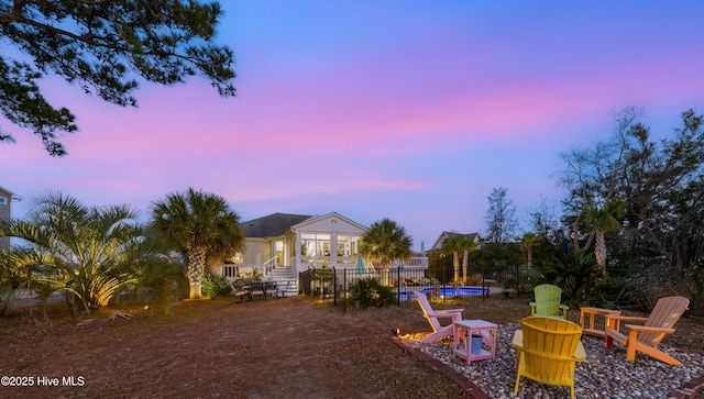 exterior space featuring a fenced in pool