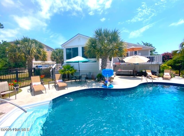 view of pool with a patio