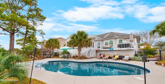 view of pool featuring a patio