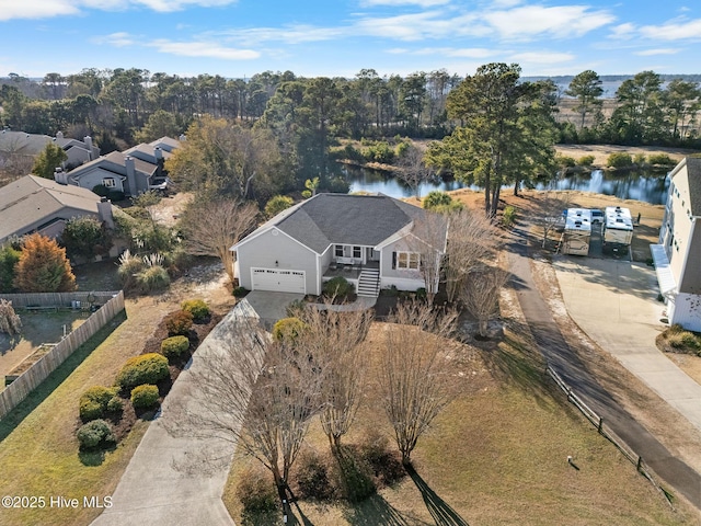 birds eye view of property featuring a water view