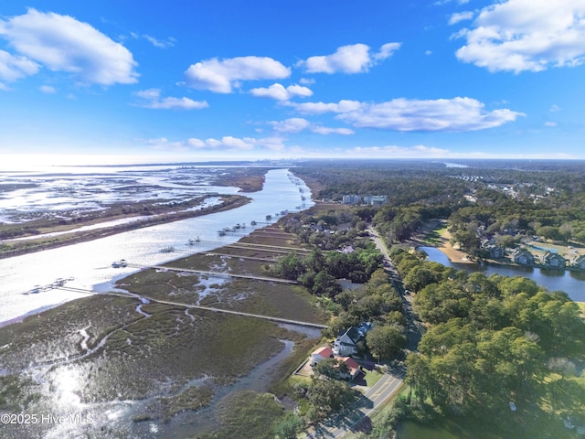 bird's eye view featuring a beach view and a water view