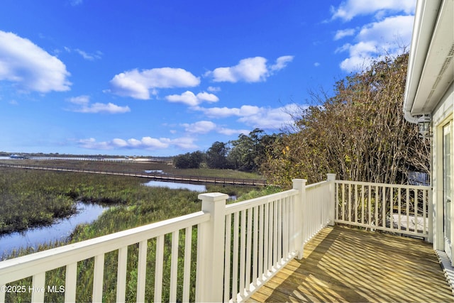 deck featuring a water view