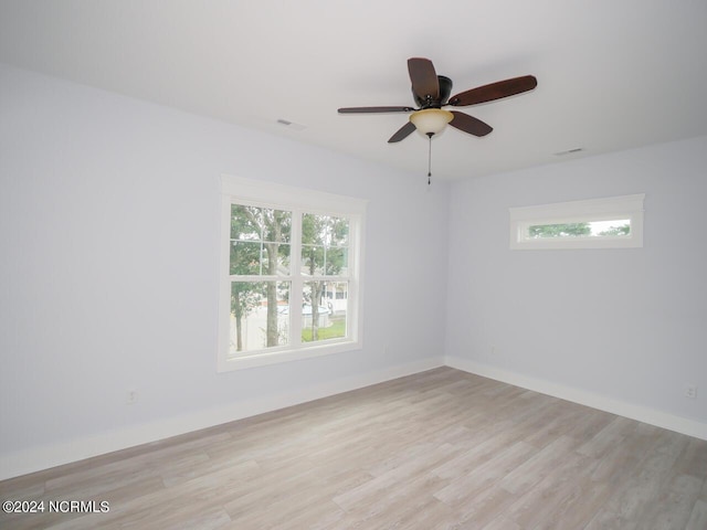 unfurnished room with light hardwood / wood-style floors and ceiling fan