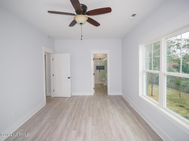 interior space featuring light hardwood / wood-style flooring and ceiling fan