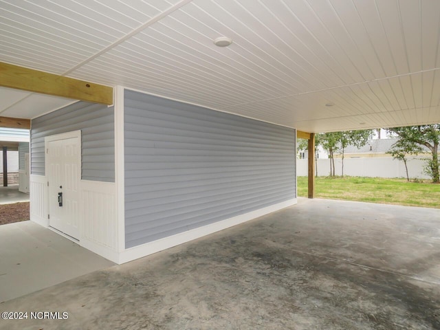 view of patio / terrace featuring a carport