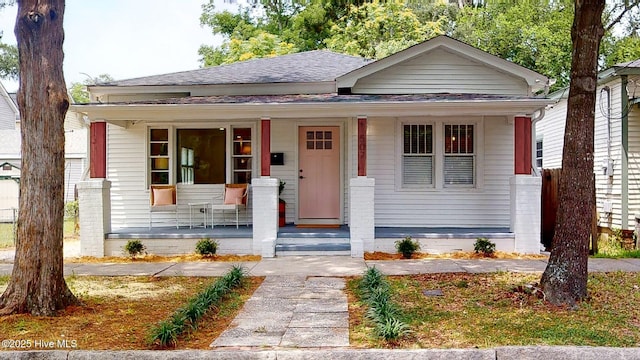 bungalow-style home featuring covered porch