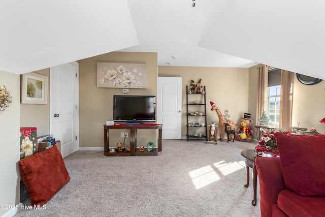 living room featuring light carpet