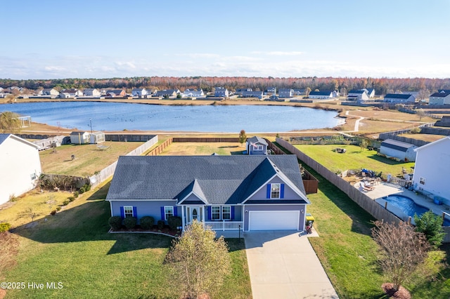 drone / aerial view featuring a water view