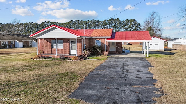 single story home featuring a front lawn, a carport, and a garage