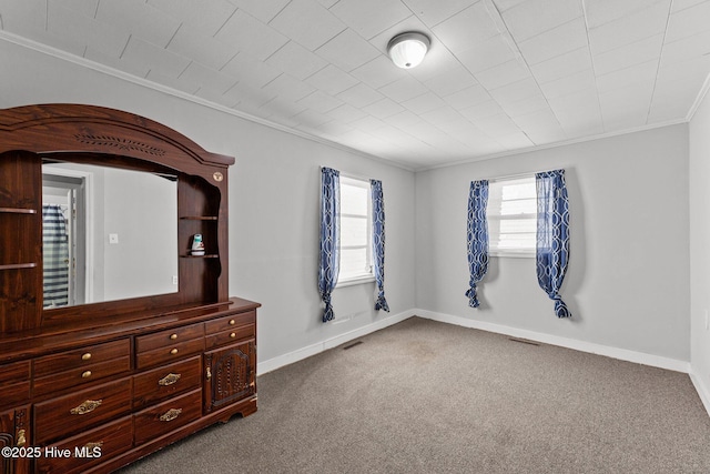 unfurnished bedroom with carpet floors and ornamental molding