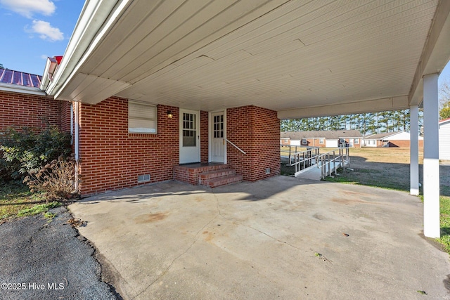 view of patio / terrace with a carport