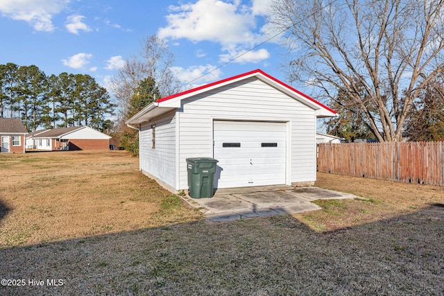 garage featuring a yard