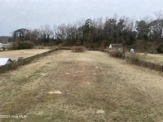 view of yard with a rural view