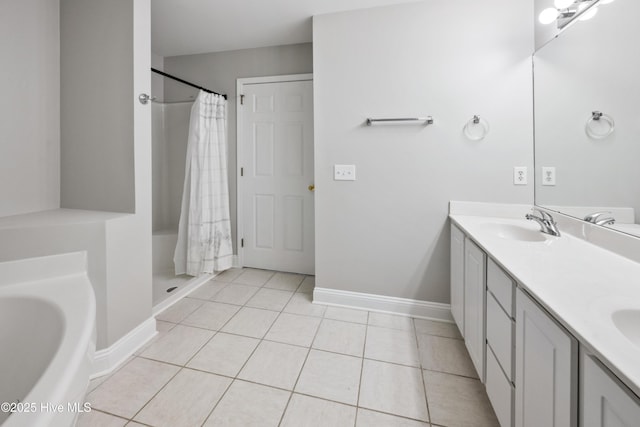 1422 Willoughby Park Ct Unit 5, Wilmington, NC 28412 - bathroom featuring double vanity, a shower with shower curtain, a bath, tile patterned flooring, and baseboards