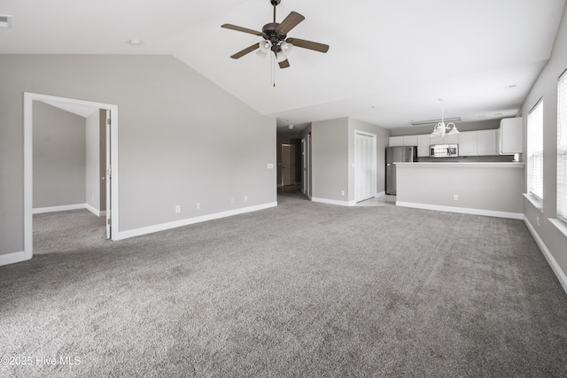 1422 Willoughby Park Ct Unit 5, Wilmington, NC 28412 - unfurnished living room featuring carpet flooring, ceiling fan, lofted ceiling, and baseboards