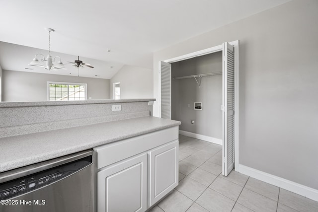 1422 Willoughby Park Ct Unit 5, Wilmington, NC 28412 - kitchen featuring dishwasher, white cabinets, light countertops, light tile patterned floors, and lofted ceiling