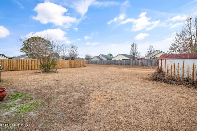 view of yard with a shed