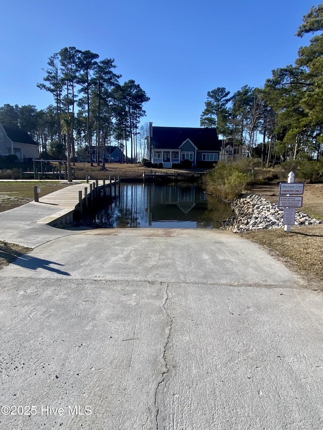 exterior space with a water view