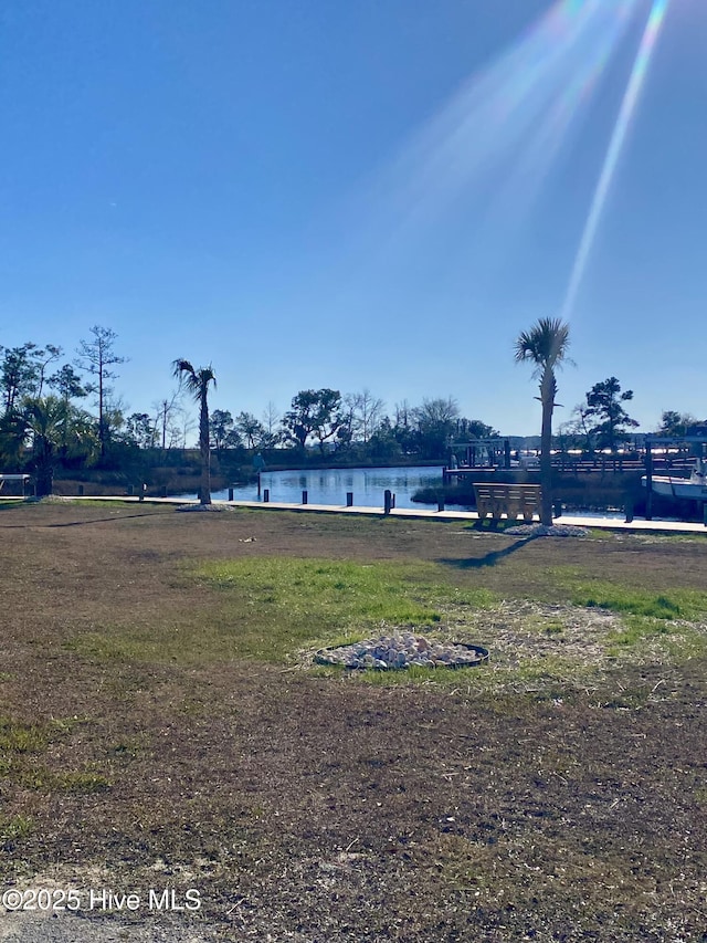 view of property's community featuring a water view