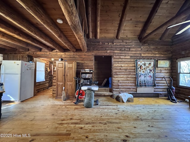 miscellaneous room featuring wooden ceiling, log walls, and light wood-type flooring