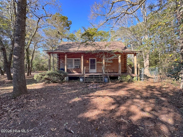 cabin with covered porch