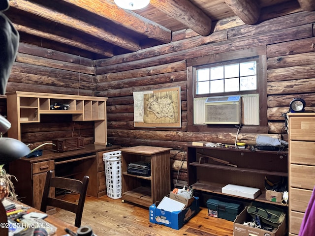 office area with cooling unit, beamed ceiling, rustic walls, wooden ceiling, and light hardwood / wood-style flooring