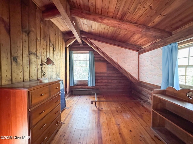 bonus room with light hardwood / wood-style flooring, log walls, beam ceiling, and wooden ceiling