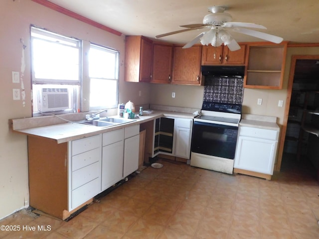 kitchen featuring cooling unit, white cabinetry, sink, ceiling fan, and electric stove