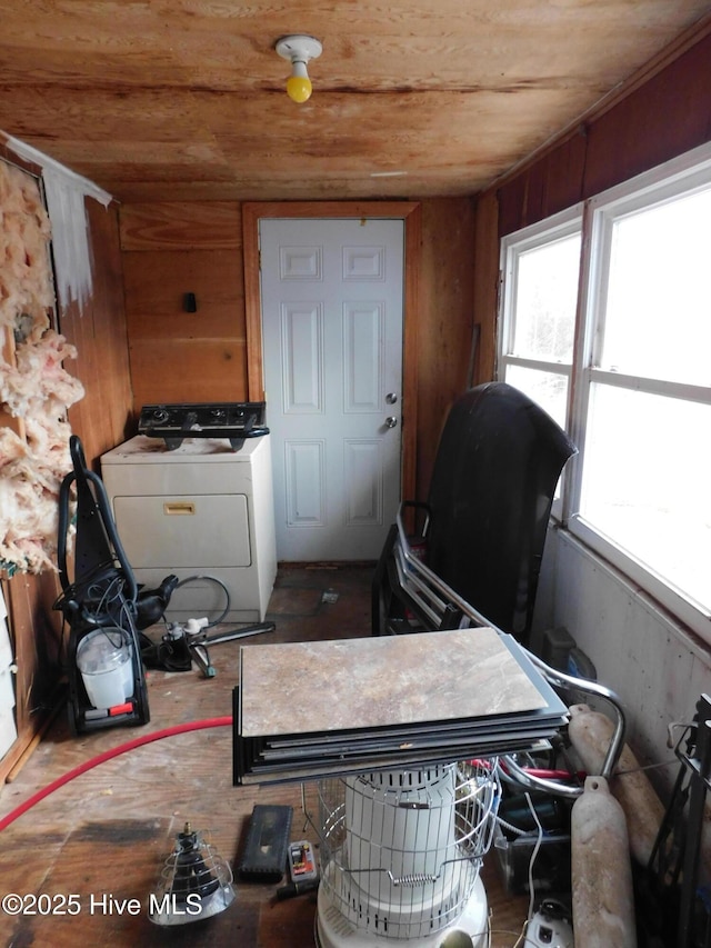 interior space with wooden ceiling and washer / clothes dryer