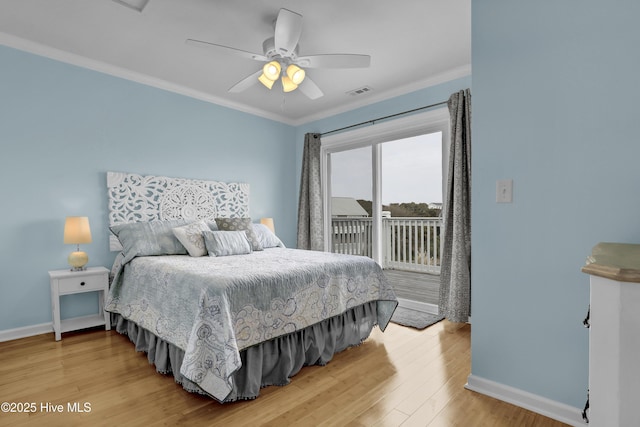 bedroom featuring ceiling fan, crown molding, and wood-type flooring