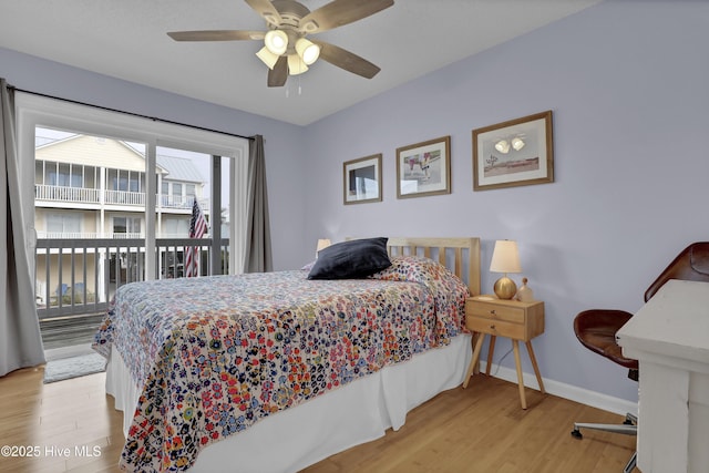 bedroom featuring access to outside, ceiling fan, and light hardwood / wood-style floors