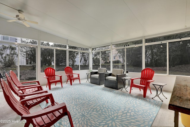 sunroom featuring ceiling fan and lofted ceiling