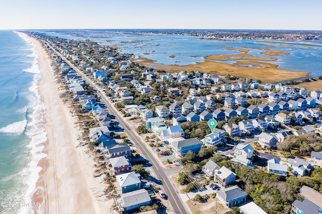 aerial view featuring a beach view and a water view