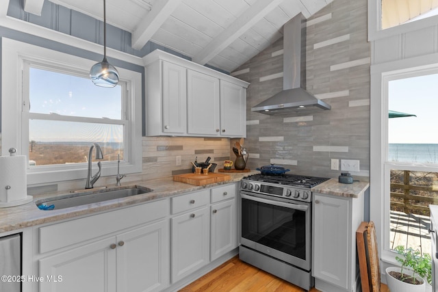 kitchen featuring white cabinets, sink, wall chimney exhaust hood, gas stove, and wood ceiling