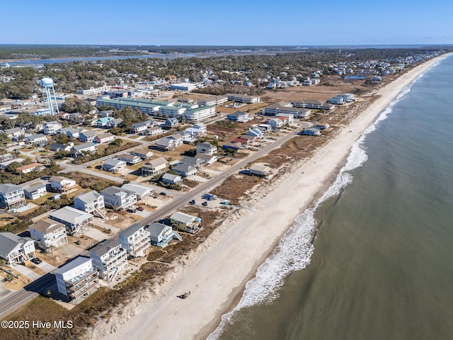 bird's eye view with a beach view and a water view