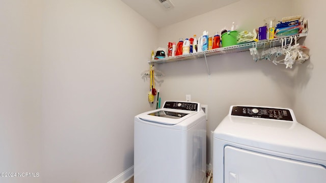 laundry area with washer and clothes dryer