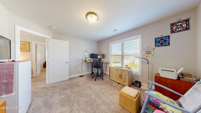 view of carpeted home office