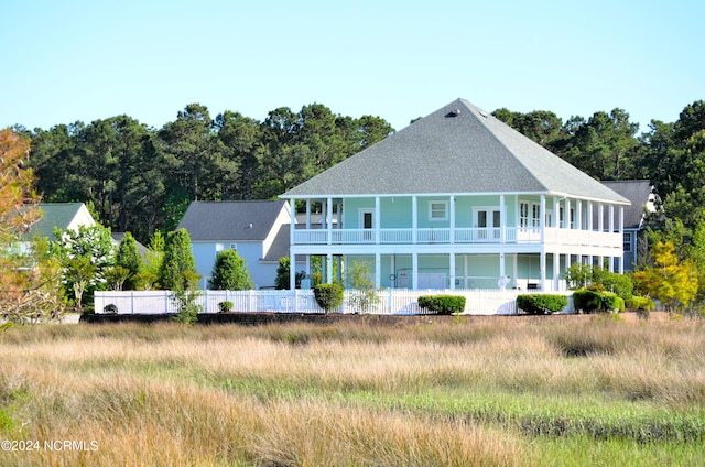 rear view of house with a balcony