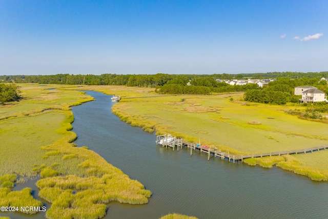 aerial view featuring a rural view and a water view