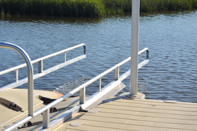 view of dock featuring a water view