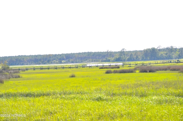 mountain view featuring a rural view