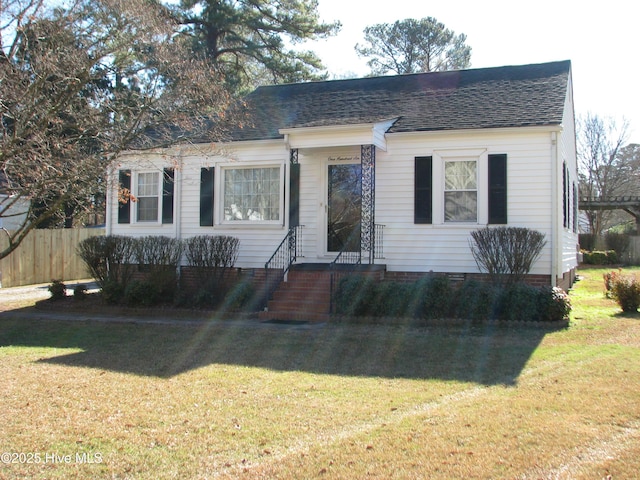 view of front of property with a front lawn